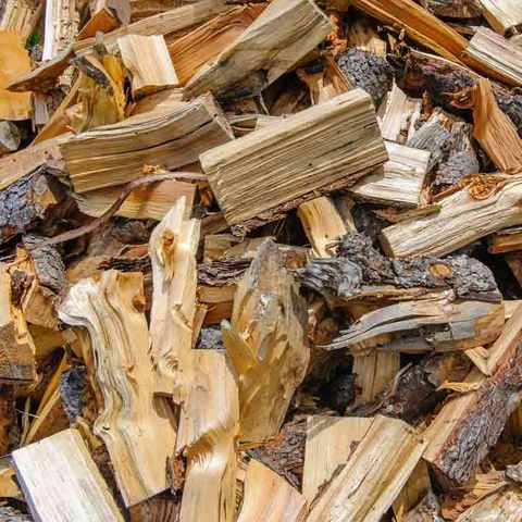 Bûches de bois de chauffage fendues, livrées en vrac